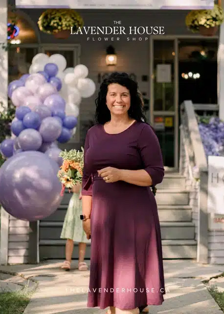 Kimberly standing in front of the Lavender House Flower Shop